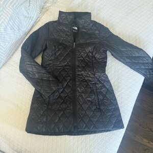 The North Face Black Puffer Jacket with Quilted Design